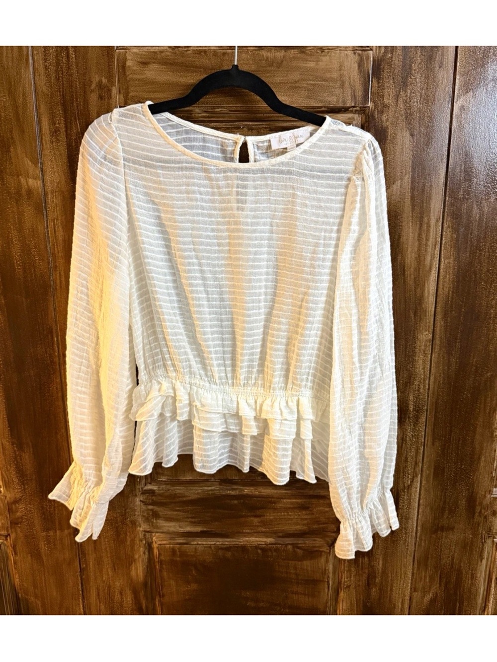 Women’s White Ruffle Hem Long Sleeve Top